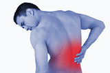 Back view of male suffering from back pain
