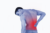 Back view of man suffering from back pain