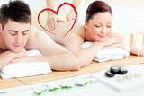 Composite image of charming young couple enjoying a back massage