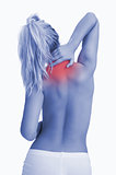 Rear view of topless woman with neck pain