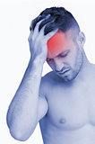 Closeup of man suffering from headache