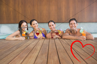 Composite image of cheerful people with drinks in swimming pool