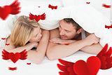 Composite image of lovely couple in their bed