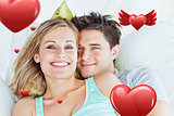 Composite image of portrait of an attractive couple hugging and relaxing on the sofa