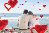 Composite image of senior couple looking at the sea