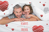 Composite image of cheerful couple under the duvet