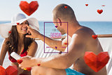 Composite image of handsome man applying sun cream on his girlfriends nose
