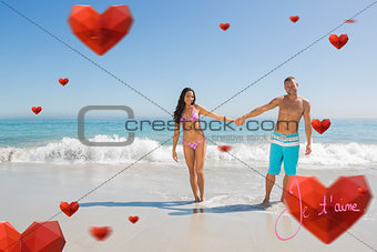 Composite image of smiling handsome man holding his girlfriends hand