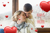 Composite image of close up of a loving young couple in winter clothing