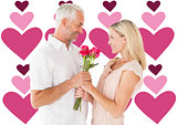 Composite image of affectionate man offering his partner roses