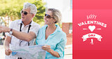 Composite image of happy tourist couple using map in the city