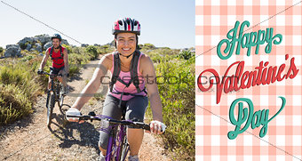 Composite image of active couple on a bike ride in the countryside