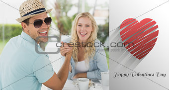 Composite image of hip young couple having coffee together