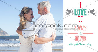 Composite image of happy couple on the beach smiling at each other