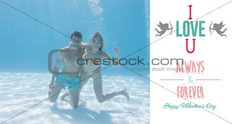 Composite image of cute couple smiling at camera underwater in the swimming pool