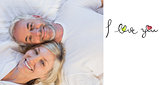 Composite image of high angle portrait of a mature couple lying in bed