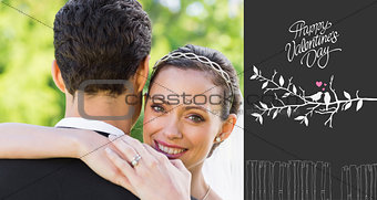 Composite image of portrait of happy bride embracing groom