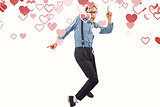 Composite image of geeky hipster dancing to vinyl