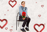 Composite image of geeky hipster holding a bunch of roses