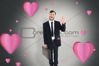 Composite image of geeky businessman waving at camera