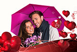 Composite image of cheerful young couple with flowers and umbrella