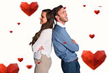 Composite image of happy young couple standing back to back