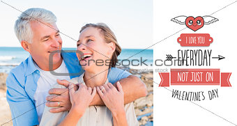 Composite image of happy casual couple by the coast