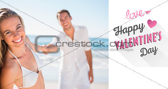 Composite image of pretty woman smiling at camera with boyfriend holding her hand