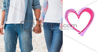 Composite image of hip young couple holding hands