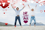 Composite image of cheerful young couple jumping at beach