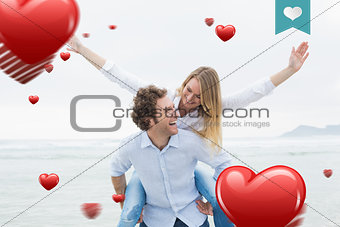Composite image of man piggybacking woman at beach