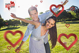Composite image of happy couple with arms outstretched at park