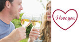 Composite image of cheerful couple toasting with white wine