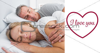 Composite image of couple sleeping and spooning in bed