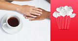 Composite image of couple having coffee together holding hands