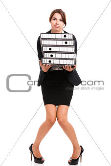 Beautiful woman carrying folders