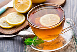 Cup of tea with mint and lemon