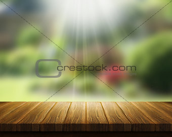 Wooden table and abstract blur landscape