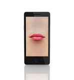 Lips in the phone. Concept of a telephone conversation.