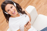 Young Woman Girl Listening to MP3 Player Headphones