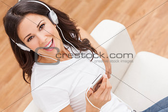 Young Woman Girl Listening to MP3 Player Headphones
