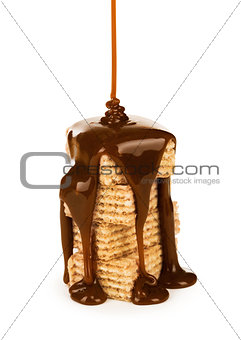 chocolate syrup on a cookies on white background