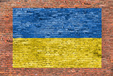 Flag of Ukraine painted over brick wall