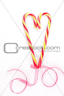 Candy cane heart background. Christmas love.