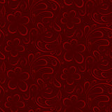 floral seamless background. red pattern to burgundy background