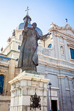 Pope John Paul II statue in front of Cathedral Almudena on a spr