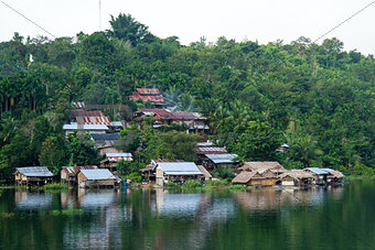 Village on mountain and riverside