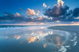 cloudscape reflected in North sea waves