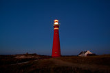 red lighthouse in the night