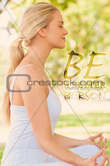 Composite image of side view of ponytailed calm woman meditating sitting in a park